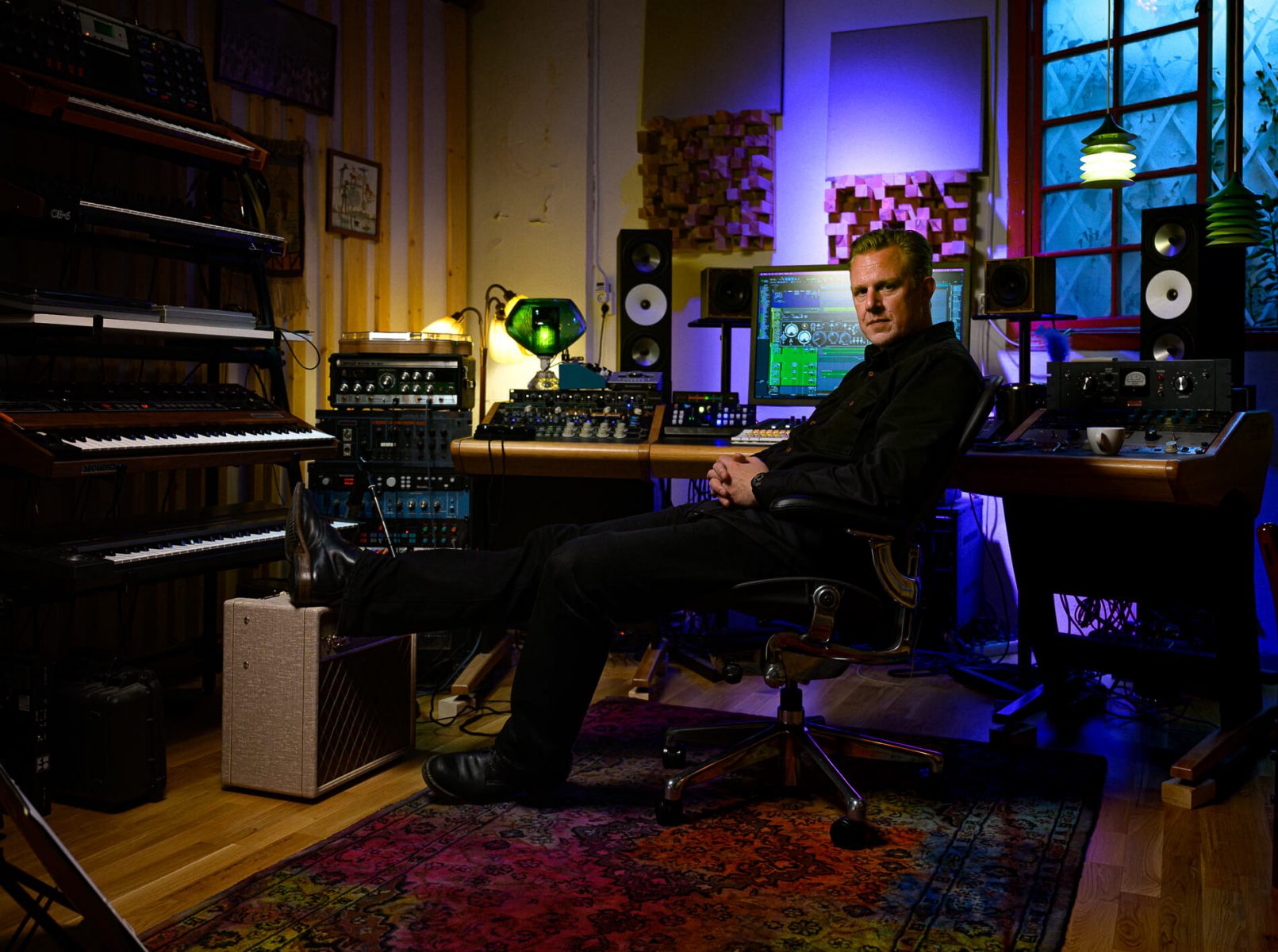 Portrait of musician Familjen in his studio. Relaxed portrait with soft light and nice atmosphere.